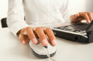Sign up for eNews: Hands working on computer