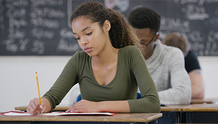 Kids in class taking a test