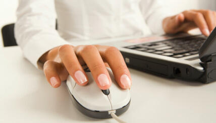 Sign up for eNews: Hands working on computer