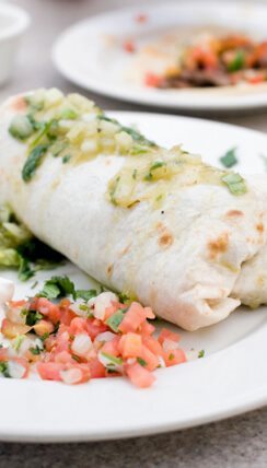 Vegetarian Burrito Served with Poblano Sauce