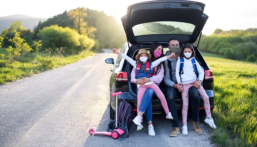 Family traveling by car