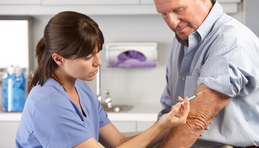 Man receiving annual flu vaccine