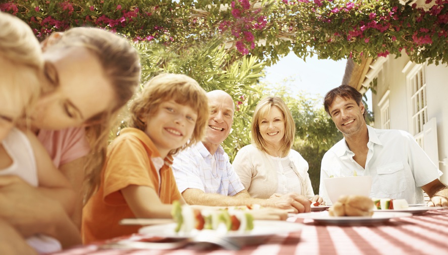 family sitting down for healthy kabobs