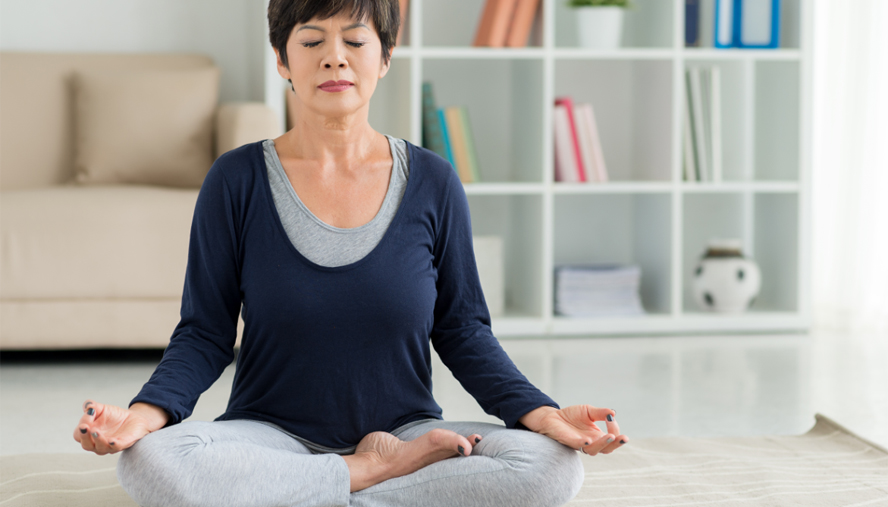 Woman meditating for her mental health