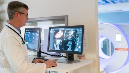 Physician reviewing MRI findings