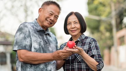 couple with an apple