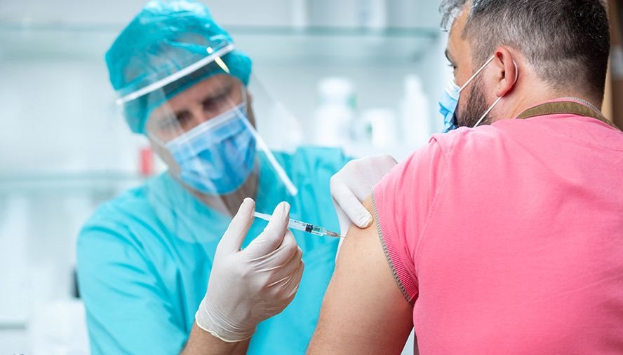 person getting a covid vaccine