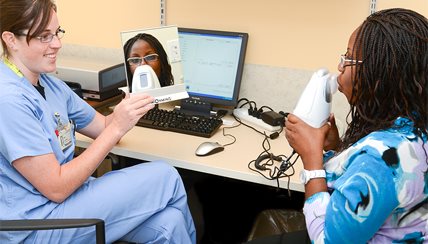 Patient receiving education from physician