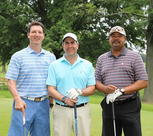 three male golfers