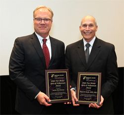Paul B. Roth, MD, MS, of University of New Mexico Health Sciences Center and James H. Hinton of Presbyterian Healthcare Services.