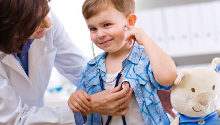 child receiving care from physician