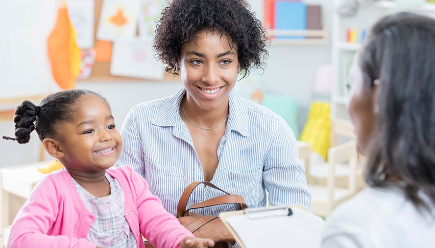 family talking with school about eczema