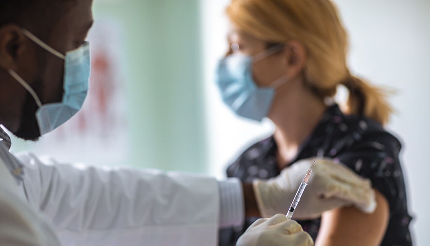 woman being vaccinated