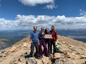 staff at top of 14er