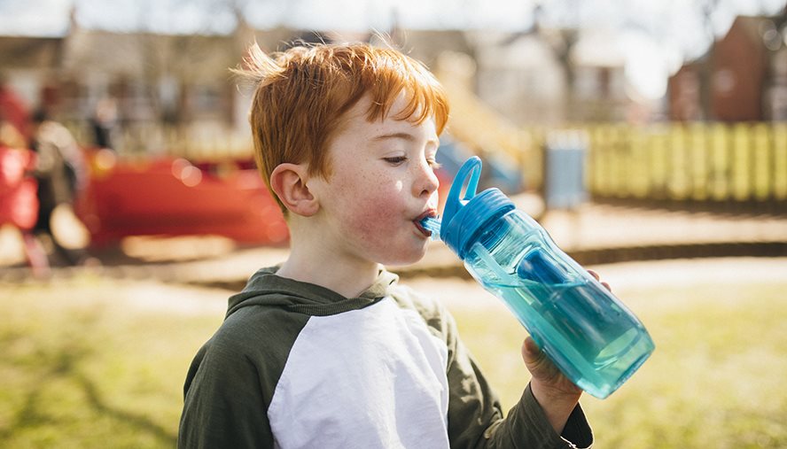 Boy drinking water