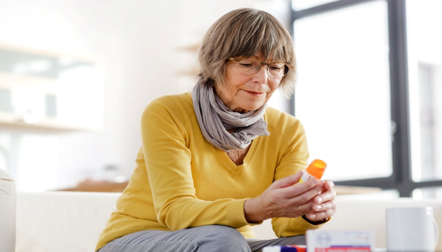 woman looking at her mobile device