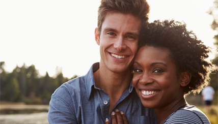 healthy couple smiling