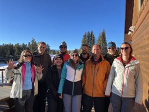 staff group picture on the ski slopes