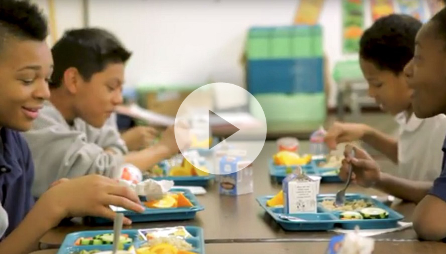 Kids eating in a cafeteria
