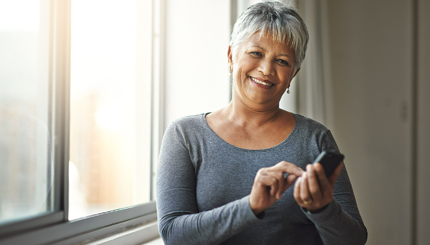 Woman use her phone to access MyChart