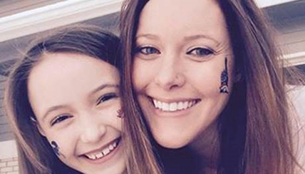 Madison Hassett smiling with her mom