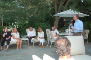 Dr. Salem speaking to guests