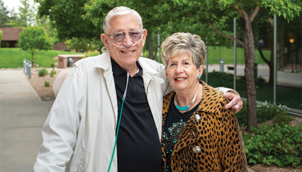 Couple holding each other and smiling