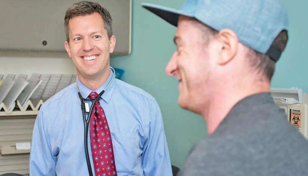 physician and patient speaking