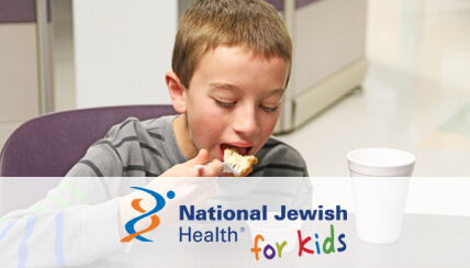 Child eating healthy with NJH logo overlay