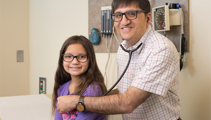 Physician and young child