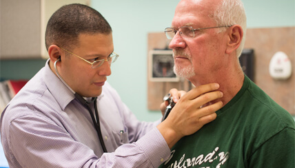 physician treating a patient