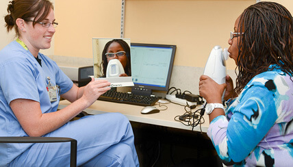 A physician testing a patient