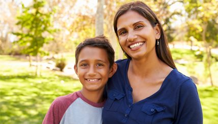 Mother and son smiling