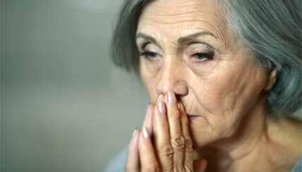 woman looking worried