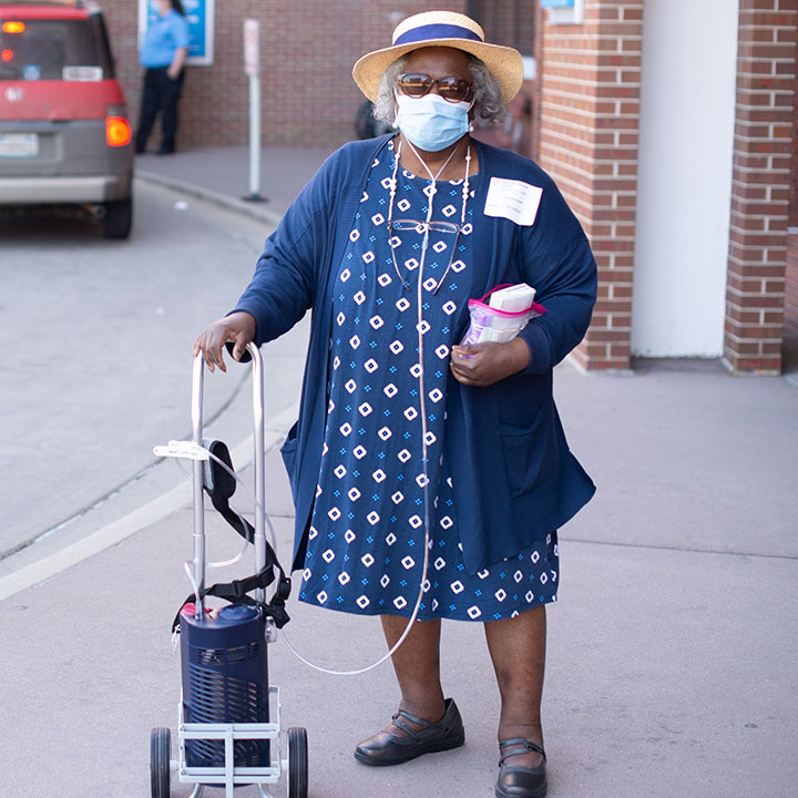 Woman walking with oxygen