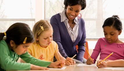 children and their teacher in class