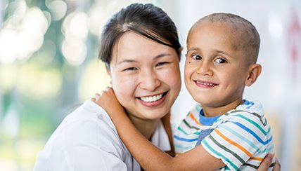 mother and son smiling