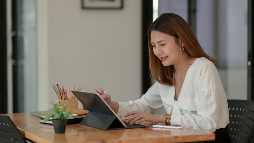 Woman on tablet with stylus