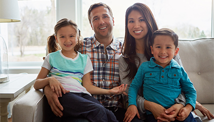 Family happily sitting together