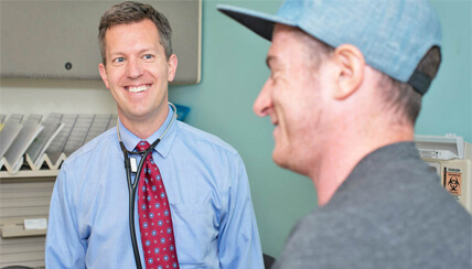 physician chatting with asthma patient